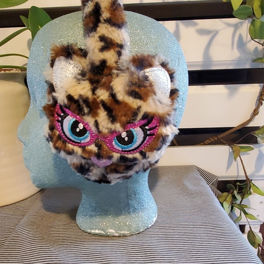 Leopard earmuffs.                 #701